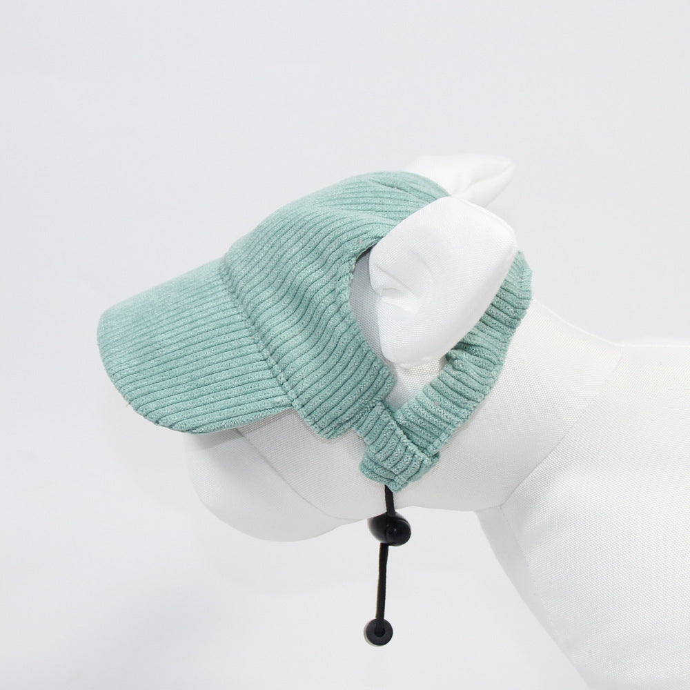 Light blue knitted hat with a black cord on a mannequin head against a white background