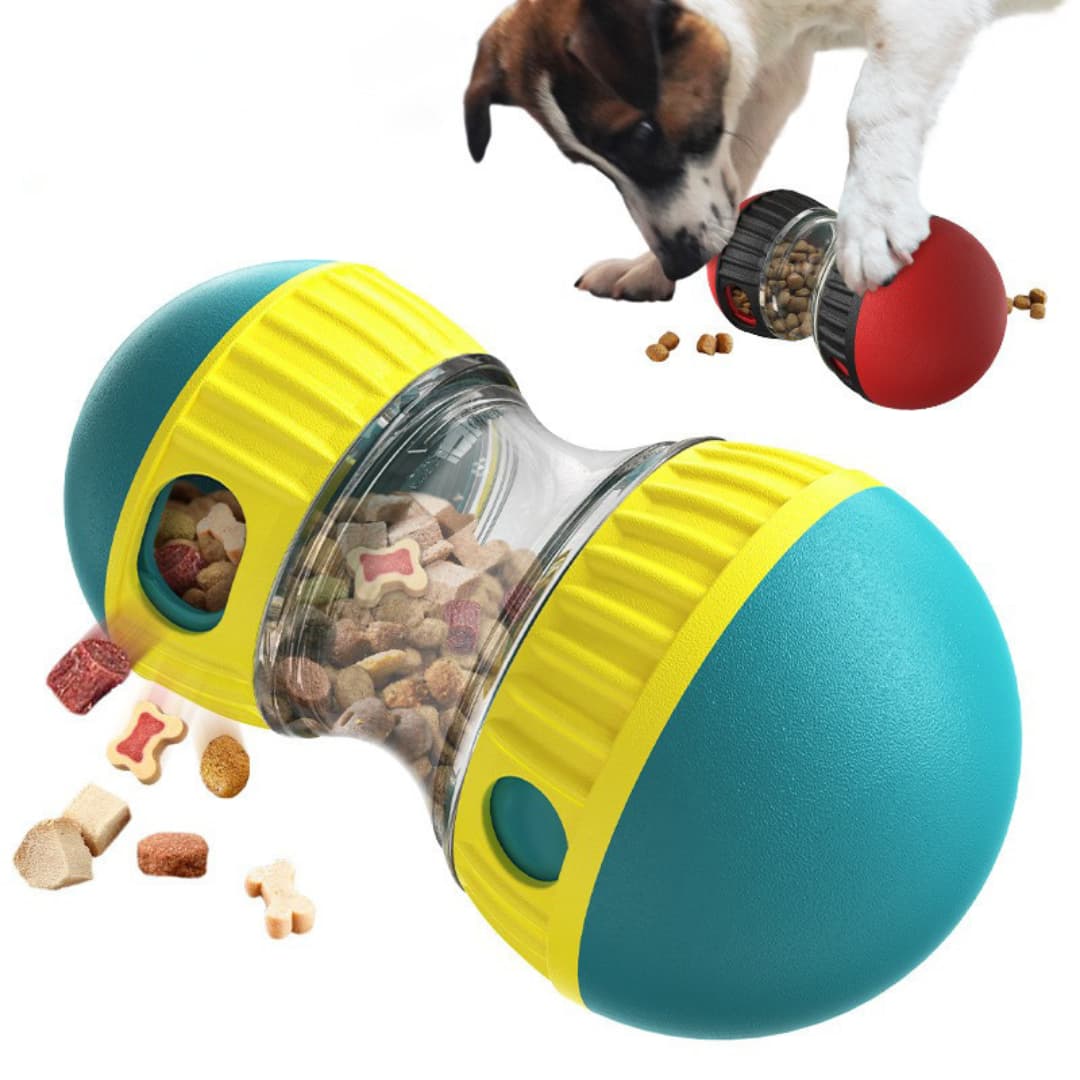 Pet toy with food dispenser and a dog interacting with it on a white background