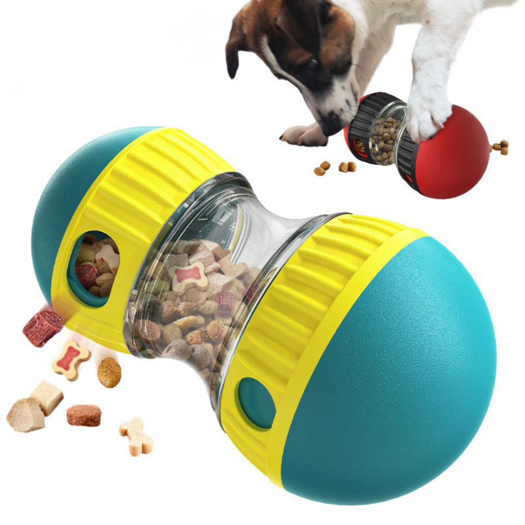 Pet toy with food dispenser and a dog interacting with it on a white background
