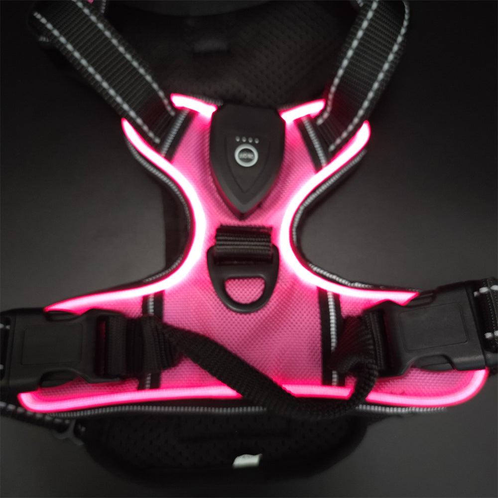 Pink LED dog harness on a black background