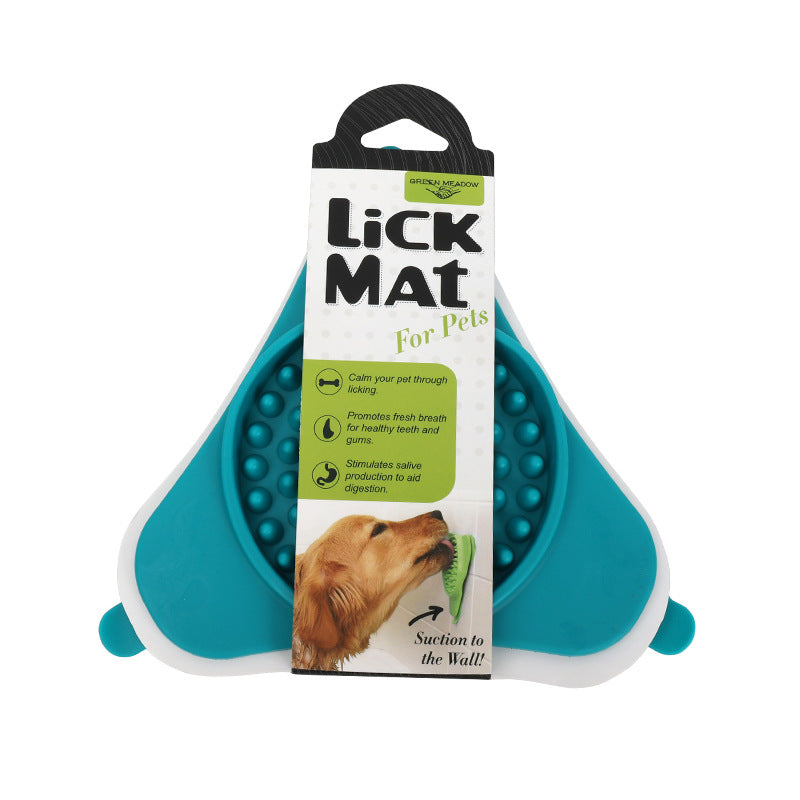Teal and white pet lick mat with packaging on a white background