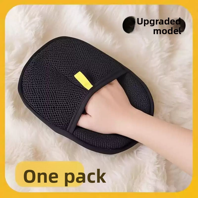 Black mesh furniture hair removal glove with yellow label on a white background, labeled 'Upgraded model' and 'One pack'.