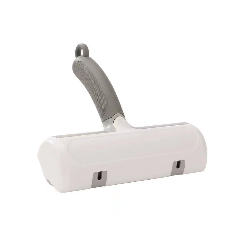 White pet grooming brush with gray handle on a white background
