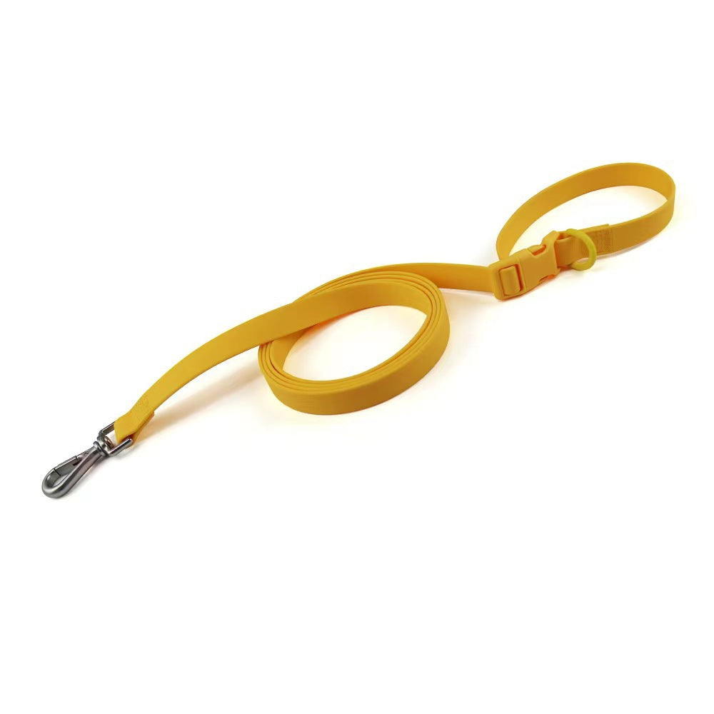 Yellow dog leash with a clip on a white background