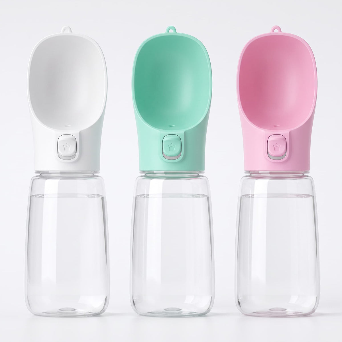 Three large portable pet water bottles in white, mint green and pink displayed side by side on white background