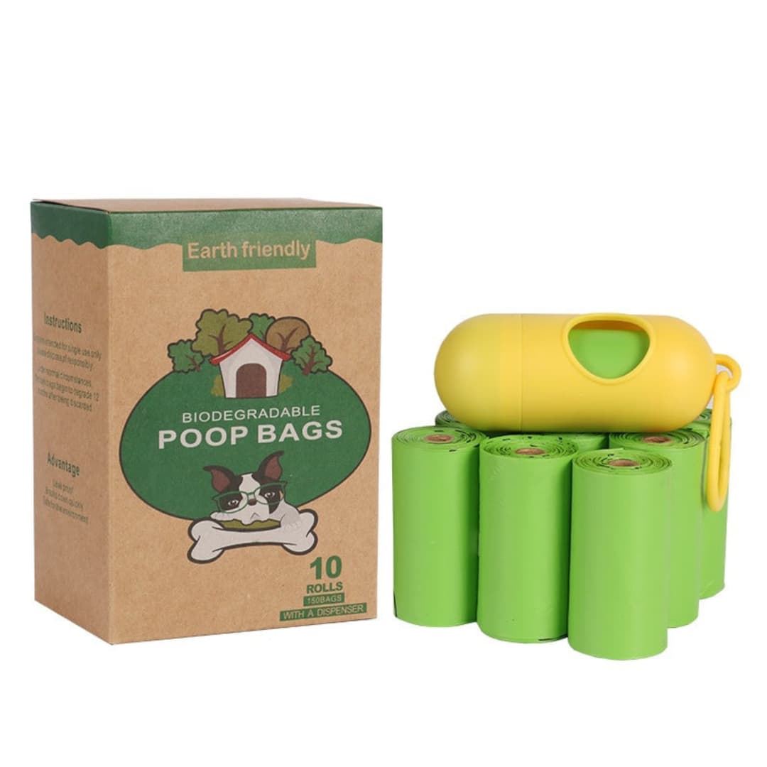 Box of biodegradable poop bags with green rolls and a yellow dispenser on a white background