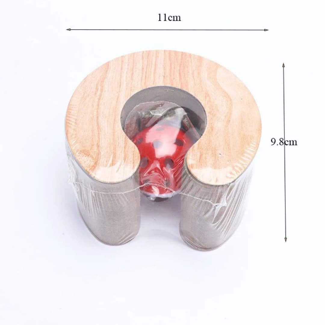 Wooden and metal container with a red object inside, showing dimensions on a white background.