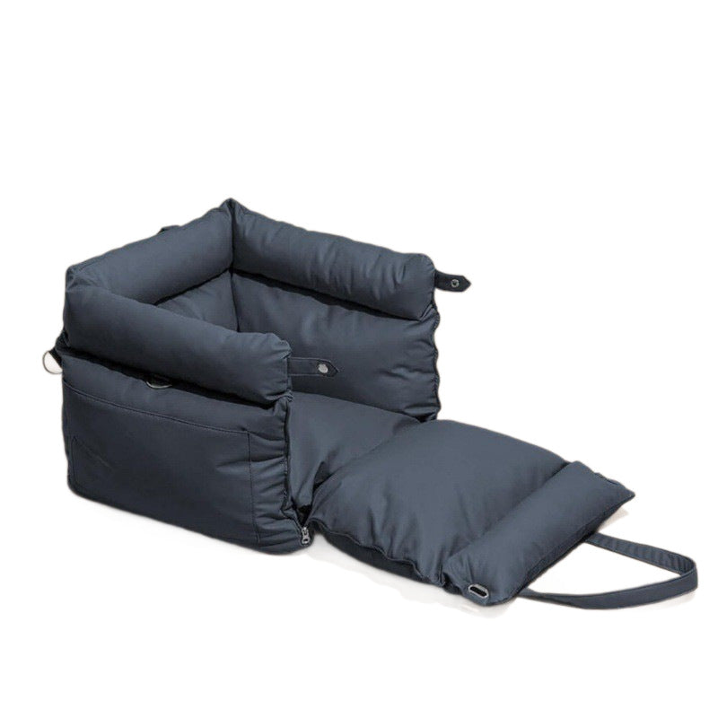 Dark blue pet bed with a handle on a white background