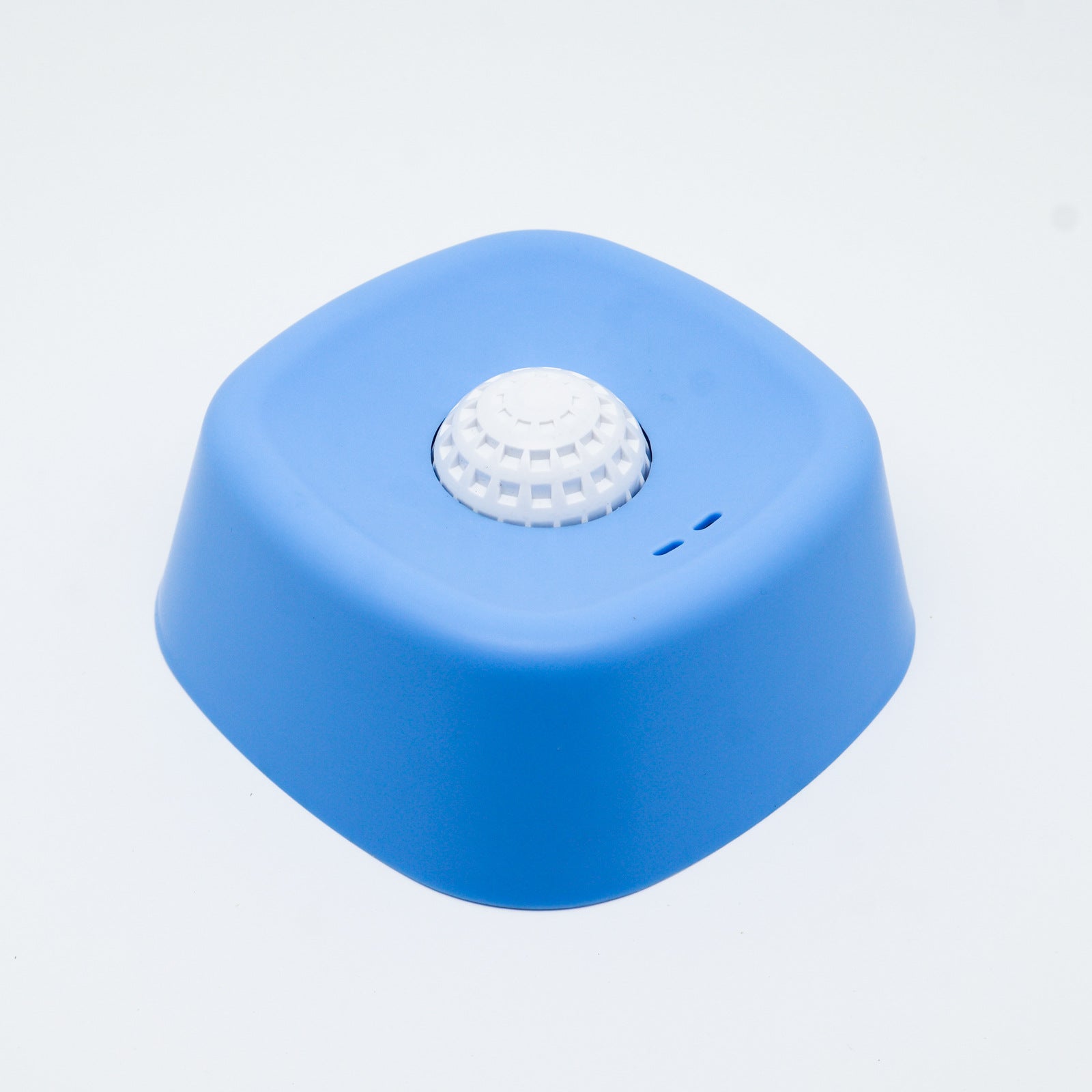 Blue hexagonal sensor on a light grey background