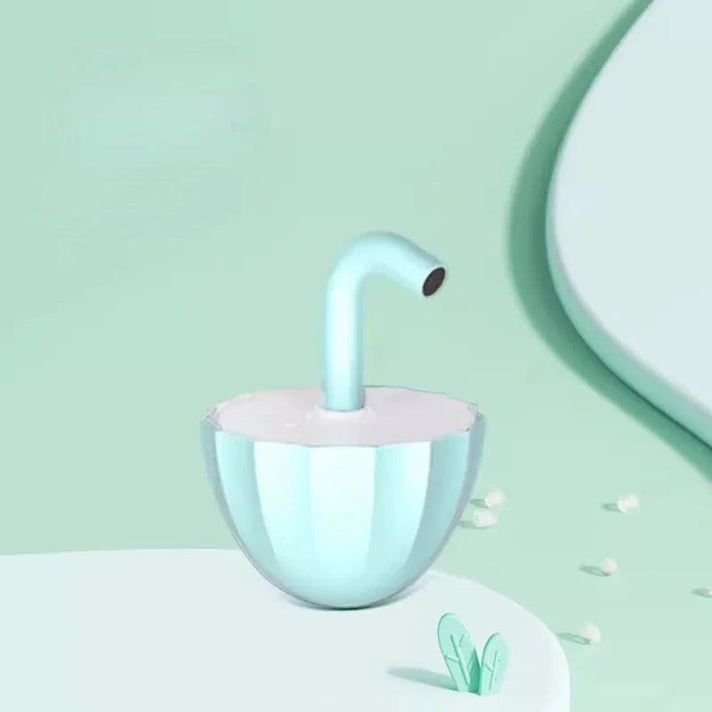 Light blue and pink hairbrush on a light green background