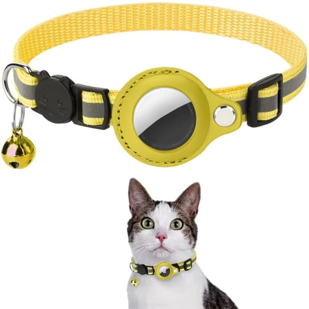 Yellow and black cat collar with a bell on a white background