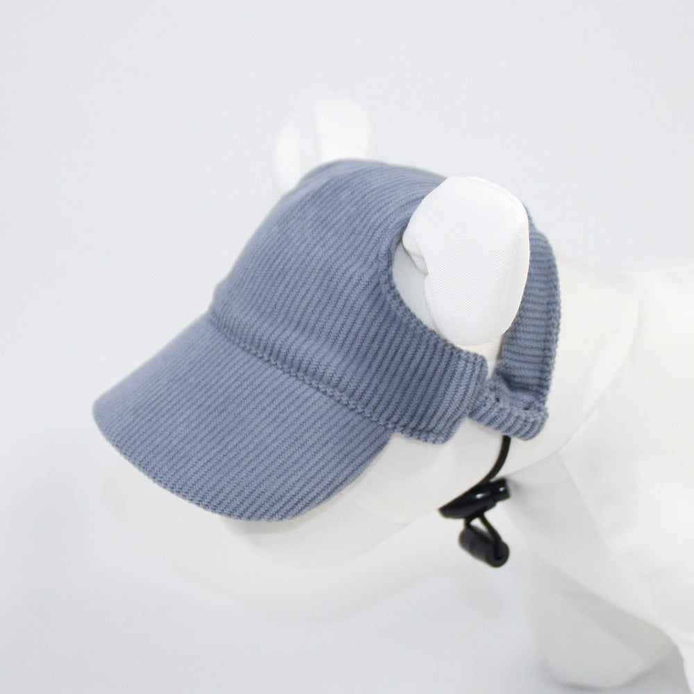 Blue knitted visor cap on a mannequin head against a white background