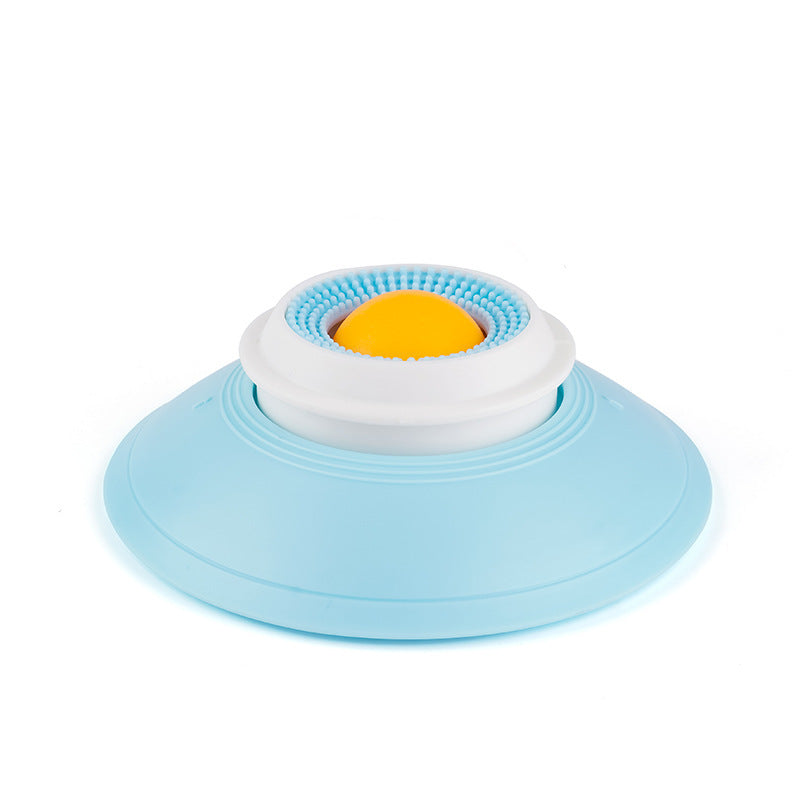 Blue and white cat slow feeder cup with a yellow centre on a white background