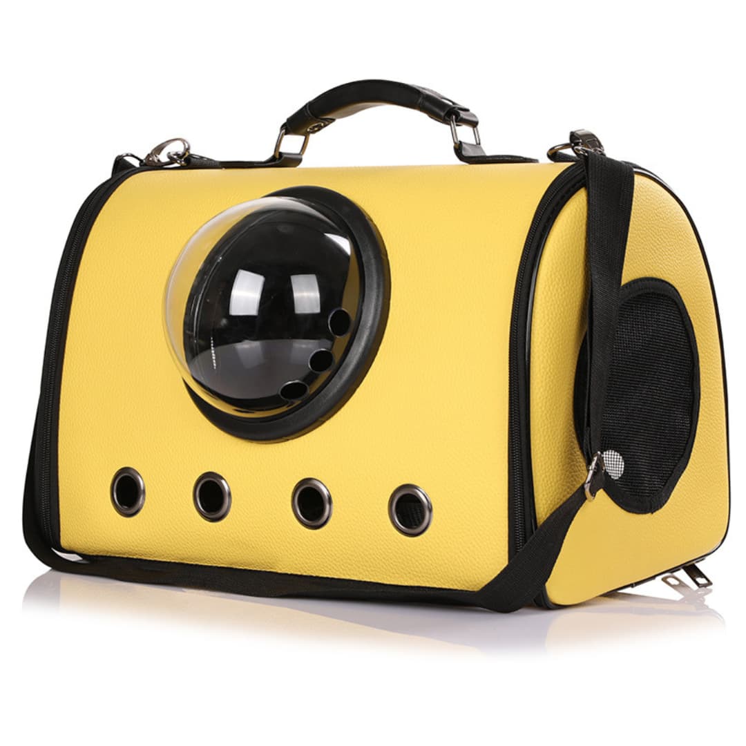 Yellow pet carrier with a clear bubble window on a white background