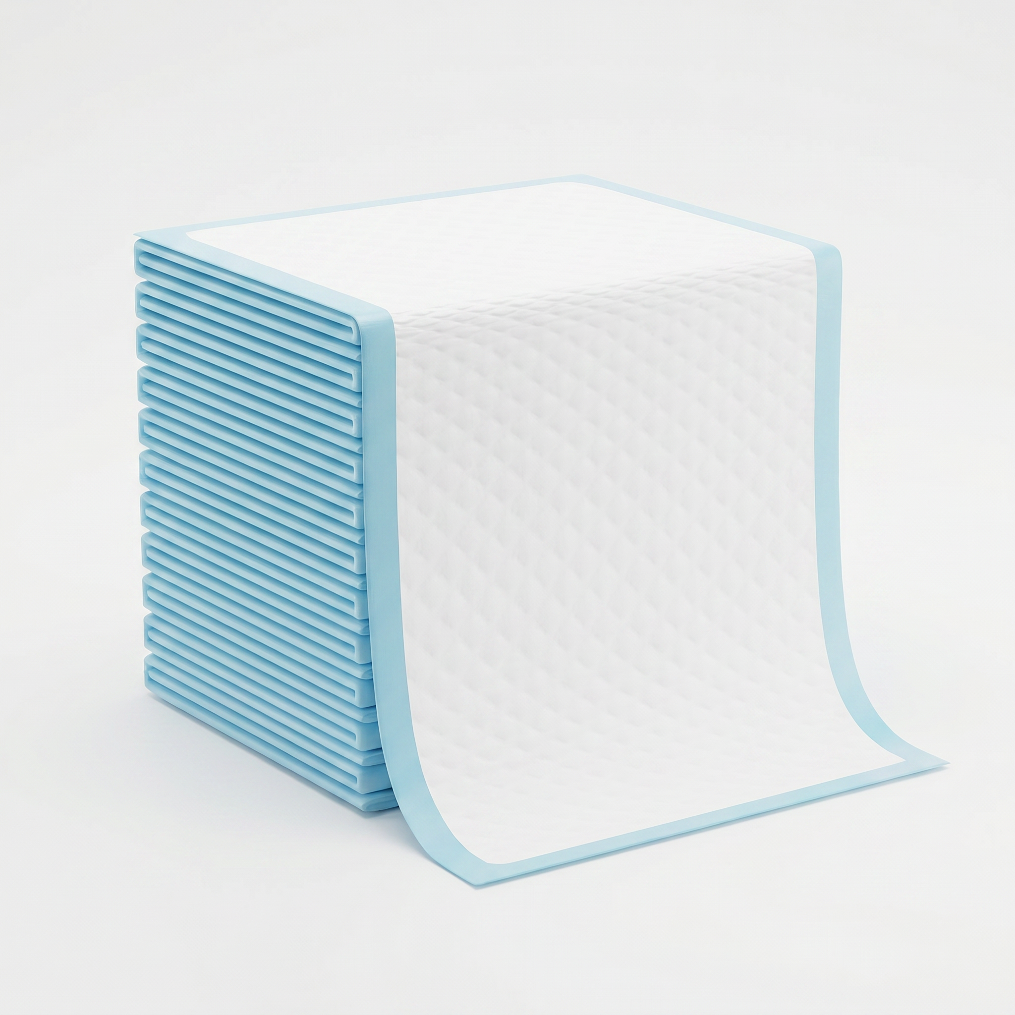 Stack of light blue and white absorbent pads on a light grey background