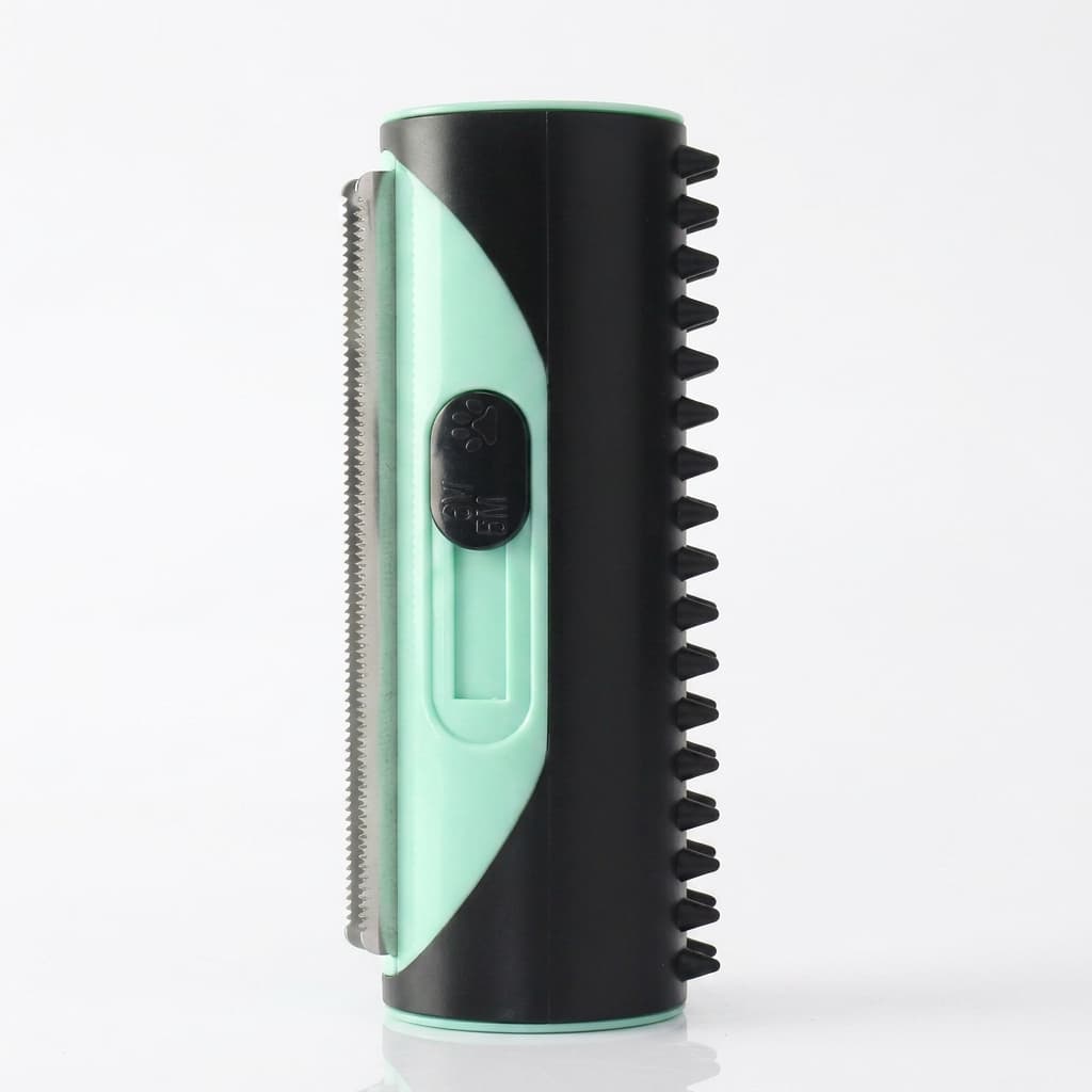 A cylindrical pet grooming brush with a black body, mint green accents, and a side-mounted metal comb, shown on a clean white background.