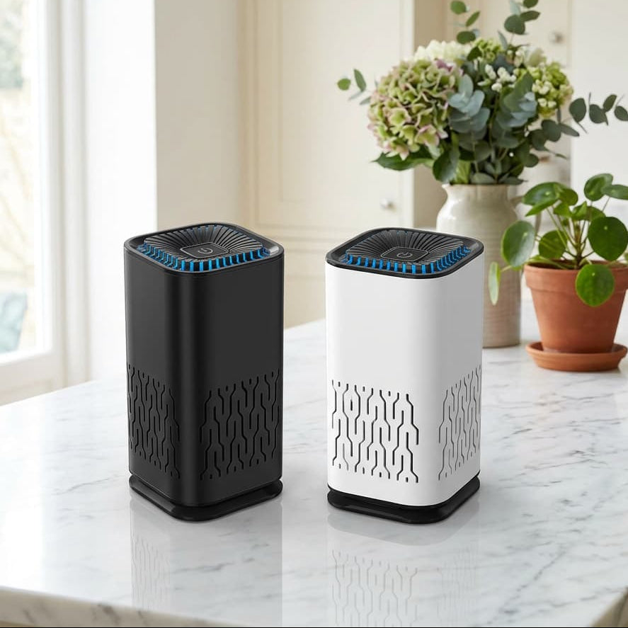 2 pet friendly air purifiers black and white sitting on a kitchen counter top in a UK home 