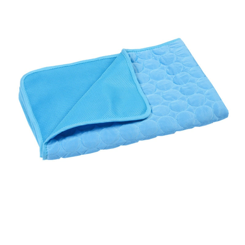 Blue pet self cooling mat on a white background