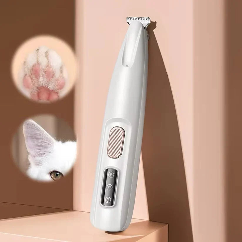Pet grooming clipper on a pink background with a small inset of a dog's paw.