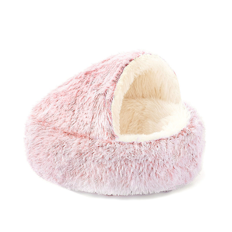 Pink fluffy pet bed with a white interior on a white background