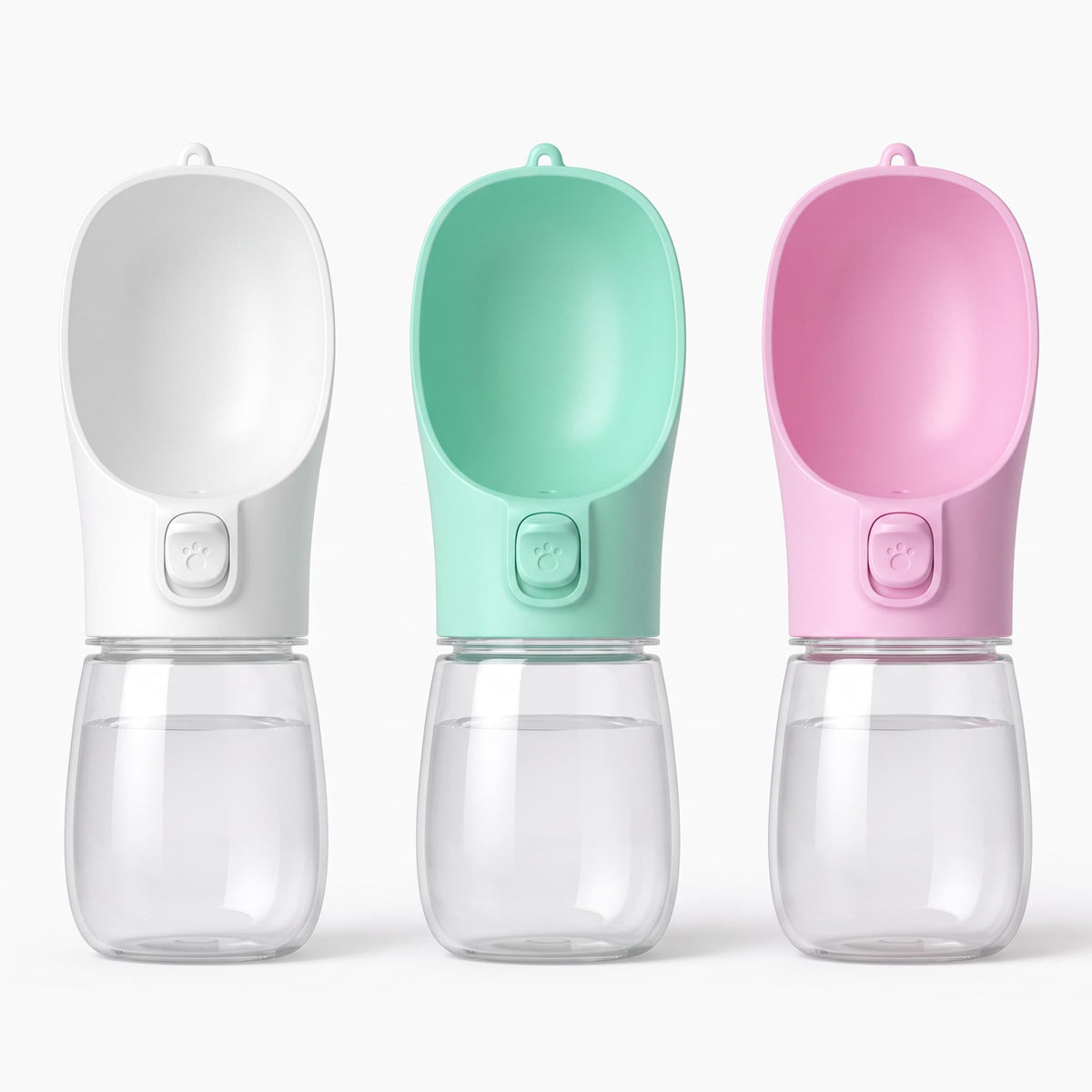 Three small portable pet water bottles in white, mint green and pink displayed side by side on white background