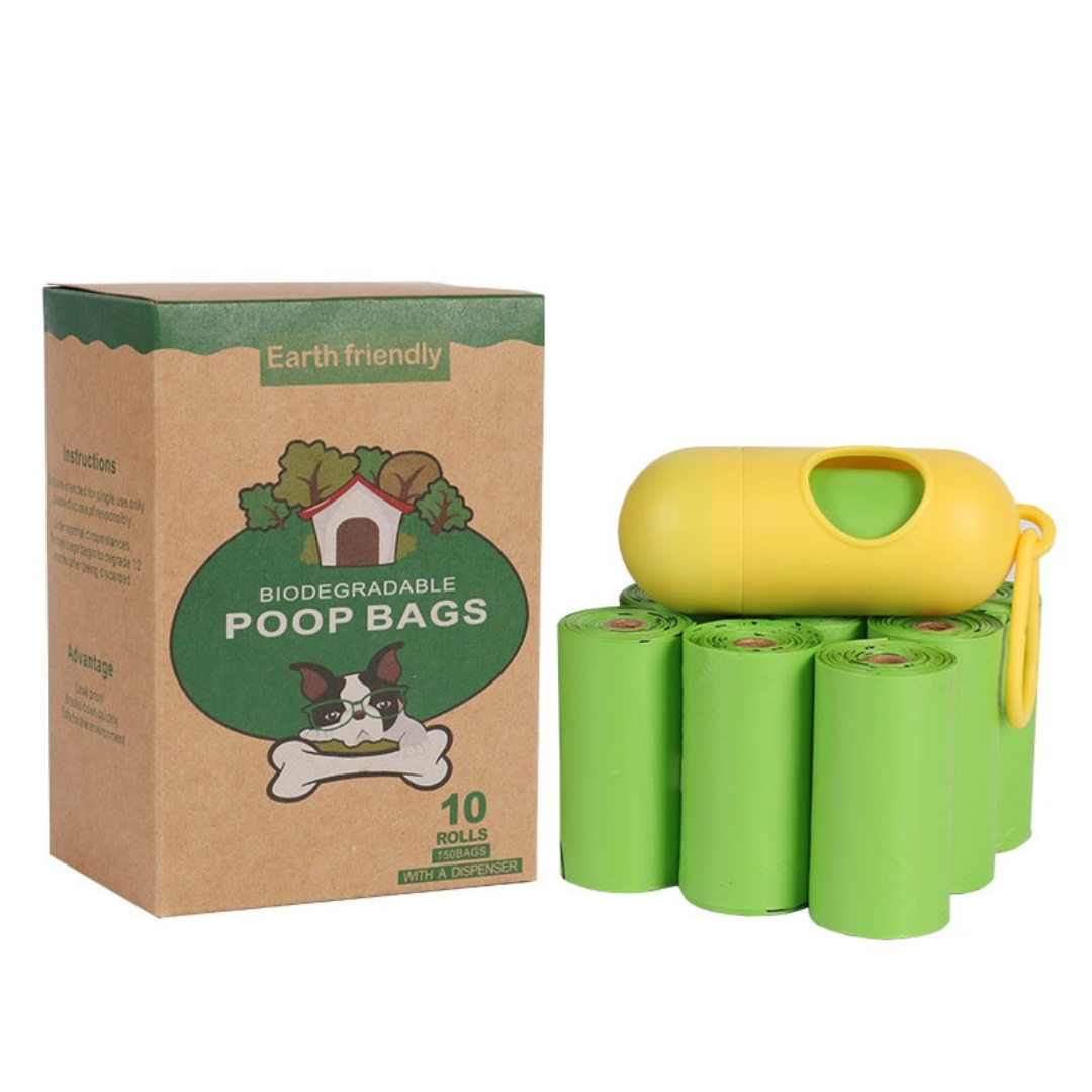 Box of biodegradable poop bags with green rolls and a yellow dispenser on a white background