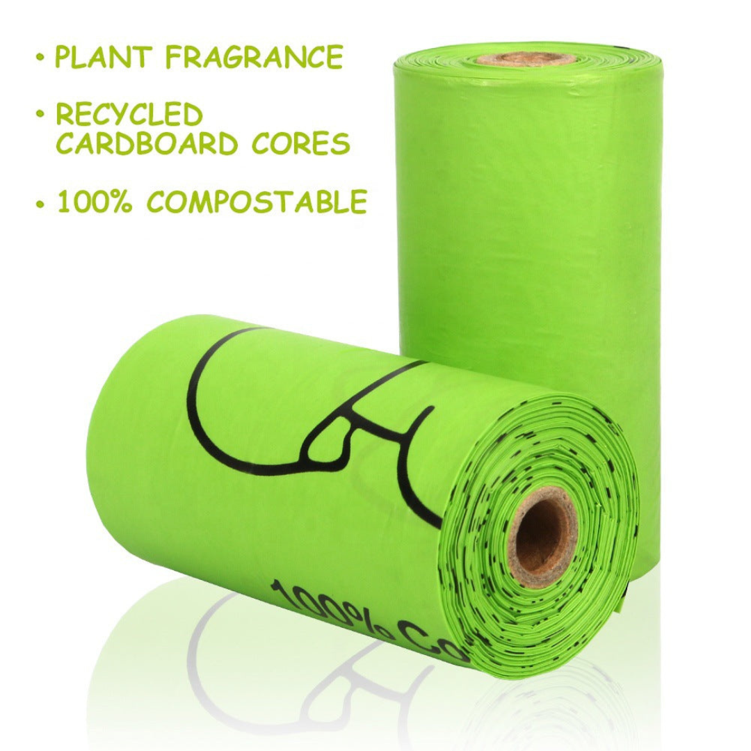 Two rolls of green compostable material with text highlighting plant fragrance, recycled cardboard cores, and 100% compostable features.