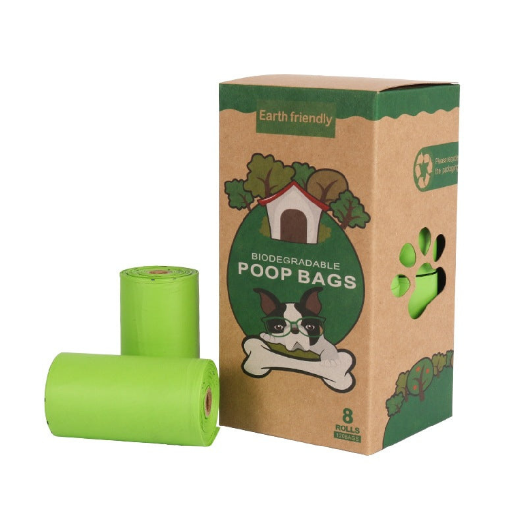 Biodegradable poop bags with a cardboard box on a white background