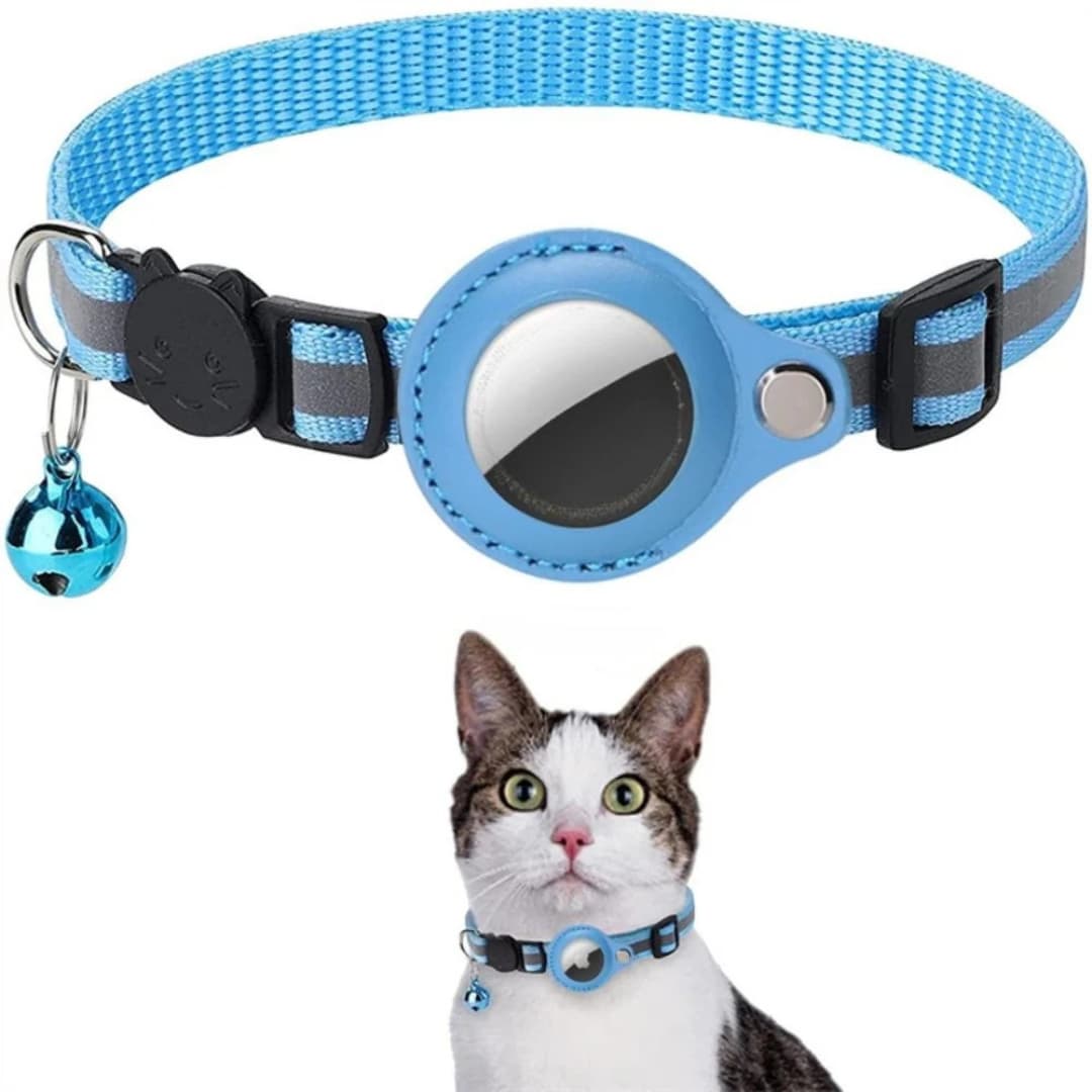 Blue pet collar with bell and reflective surface, worn by a cat on a white background
