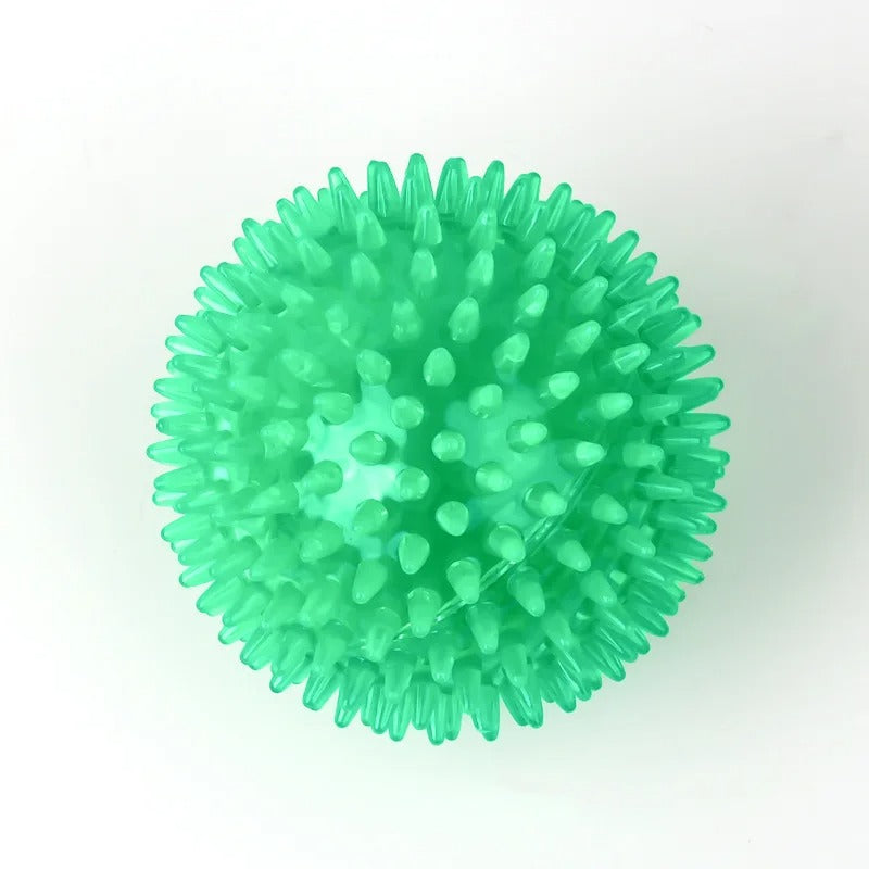 Green spiky ball on a white background