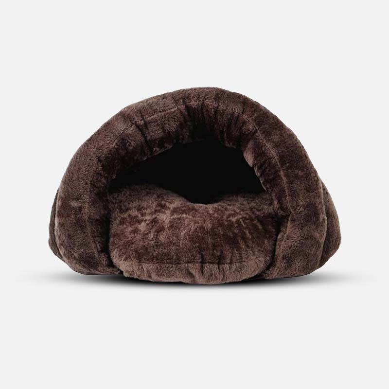 Brown plush pet bed on a white background