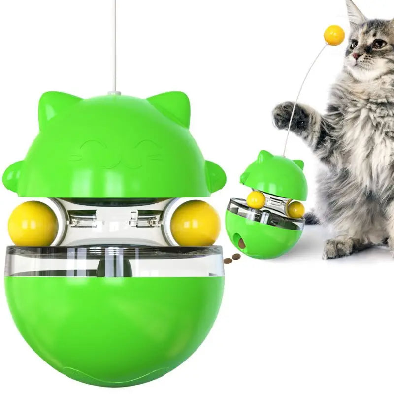 Green cat toy with yellow balls and a cat interacting with it on a white background